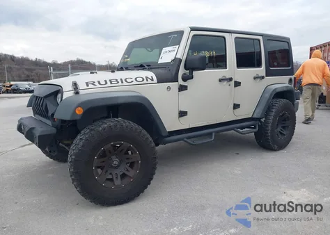 2011 Jeep Wrangler Unlimited Rubicon из США, поврежденный, VIN 1J4HA6H11BL568186